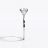 Oval cut lab-grown diamond three-stone engagement ring with pear side stones in 14K (585) white gold, side view 