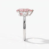Fancy Vivid Pink pear cut lab-grown diamond three-stone ring with pear side diamonds in 14K (585) white gold, side view 
