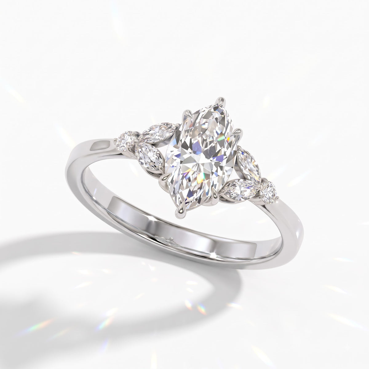 Marquise cut lab-grown diamond leaf cluster engagement ring with marquise and round accents in 14K (585) white gold, angled view 