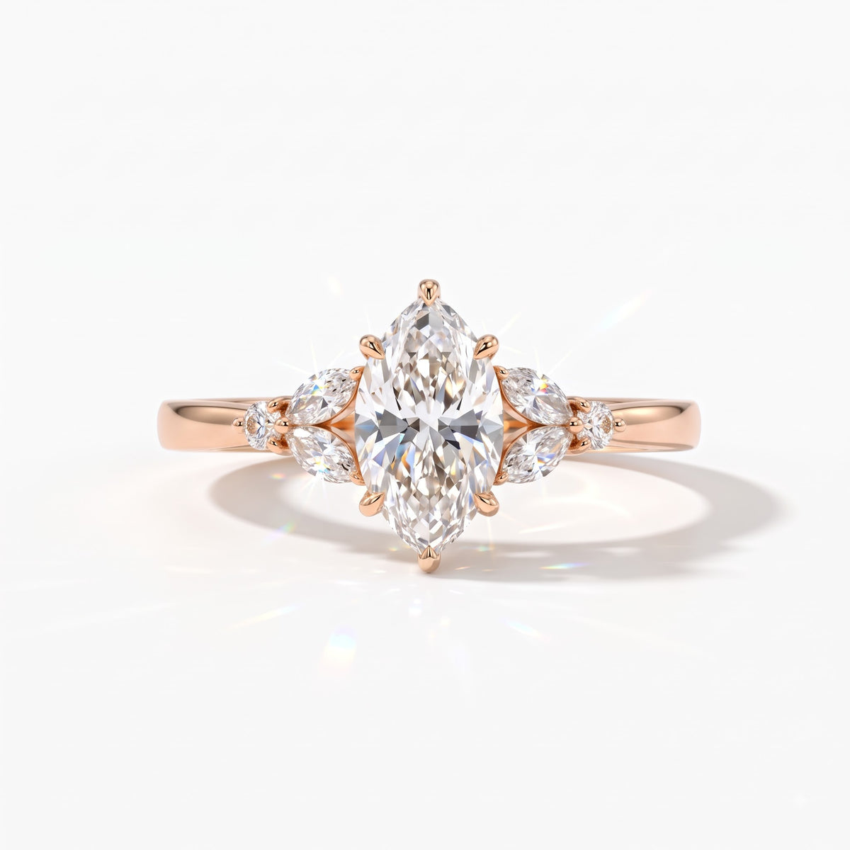 Marquise cut lab-grown diamond leaf cluster engagement ring with marquise and round accents in 14K (585) rose gold, front view 