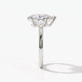 Pear cut lab-grown diamond three-stone engagement ring with pear side stones in 14K (585) white gold, side view 