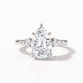 Pear cut lab-grown diamond three-stone engagement ring with pear side stones in 14K (585) white gold, front view 