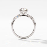 Oval lab-grown diamond cluster engagement ring with marquise and round leaf accents in 14K (585) white gold, upright profile view 