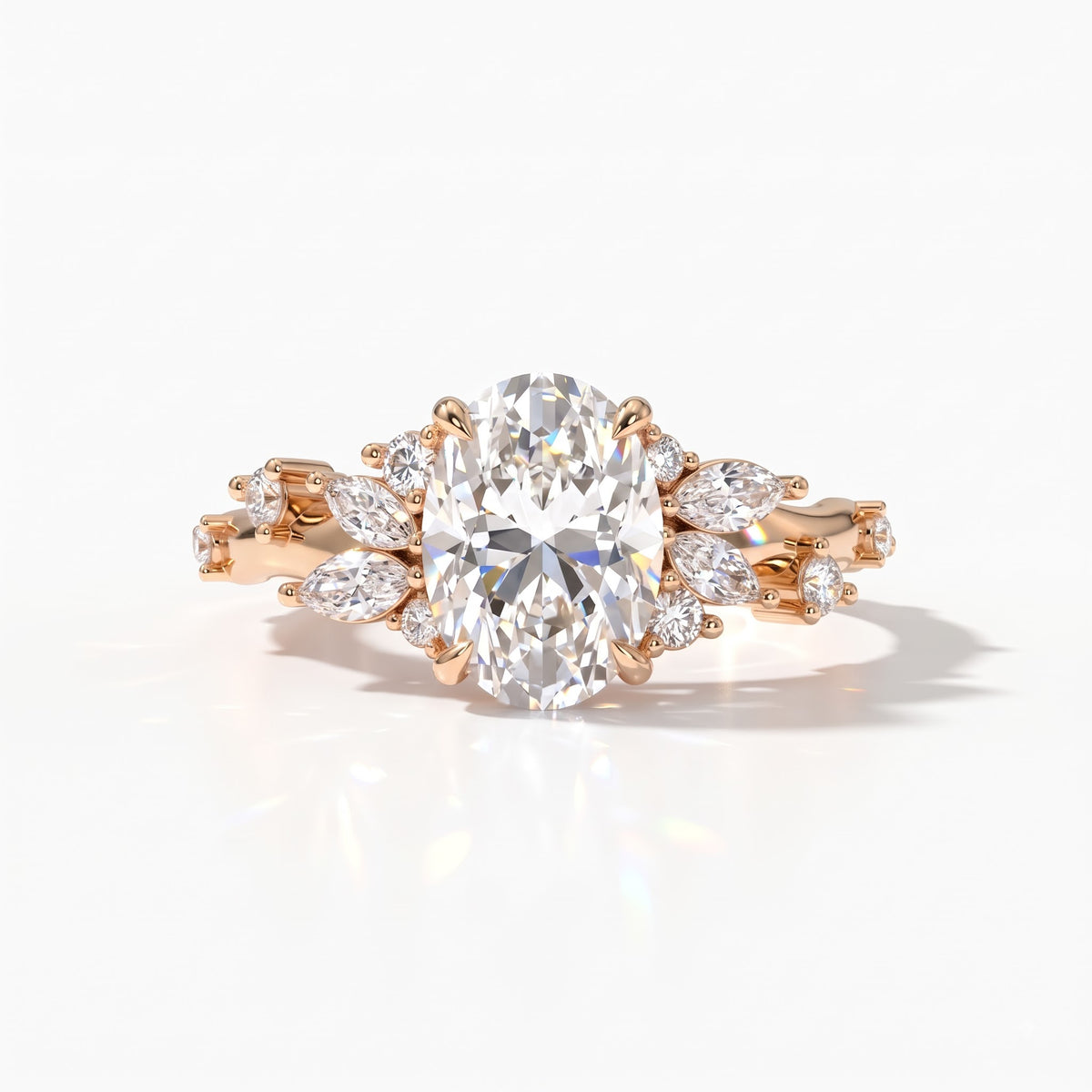 Oval lab-grown diamond cluster engagement ring with marquise and round leaf accents in 14K (585) rose gold, front view 