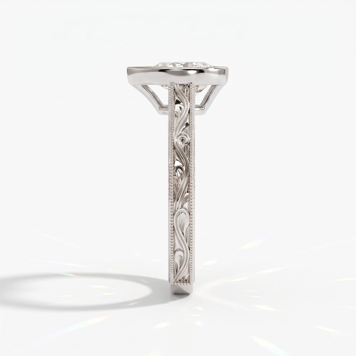 Pear cut lab-grown diamond vintage bezel engagement ring with hand-engraved milgrain band in 14K (585) white gold, side view 