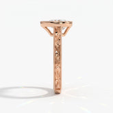 Pear cut lab-grown diamond vintage bezel engagement ring with hand-engraved milgrain band in 14K (585) rose gold, side view 