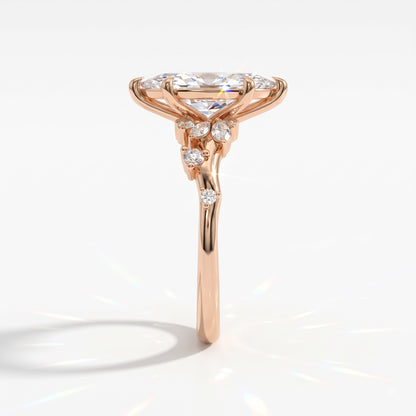 Marquise cut lab-grown diamond cluster engagement ring with marquise and round leaf accents in 14K (585) rose gold, side view 