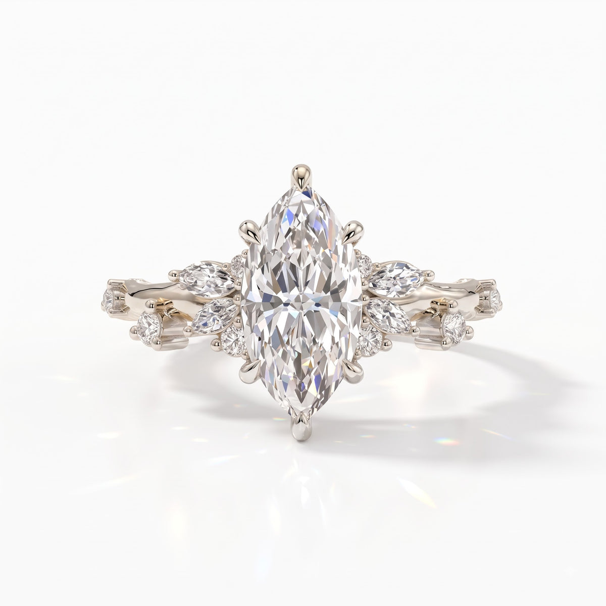 Marquise cut lab-grown diamond cluster engagement ring with marquise and round leaf accents in 14K (585) white gold, front view 