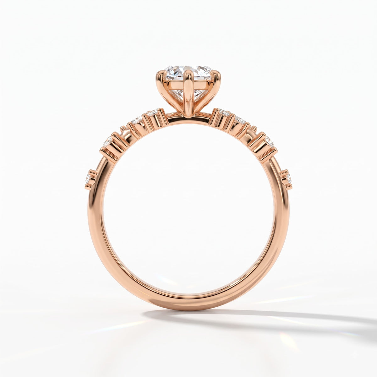 Marquise cut lab-grown diamond cluster engagement ring with marquise and round leaf accents in 14K (585) rose gold, upright profile view 