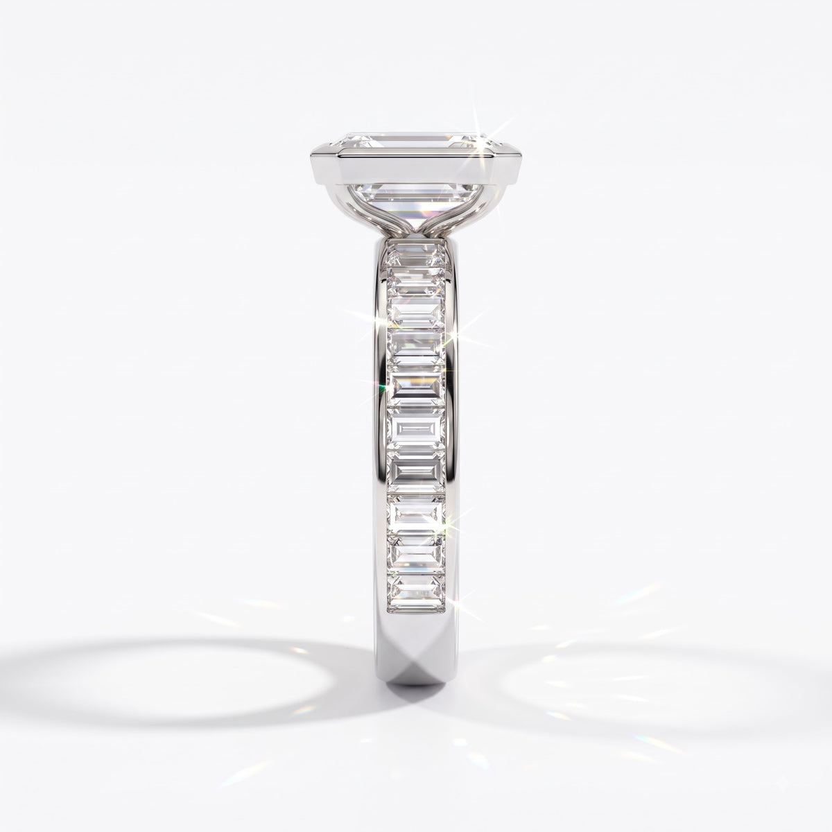 Emerald cut lab-grown diamond bezel engagement ring with channel-set baguette diamonds in 14K (585) white gold, side view 
