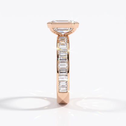 Emerald cut lab-grown diamond bezel engagement ring with channel-set baguette diamonds in 14K (585) rose gold, side view 