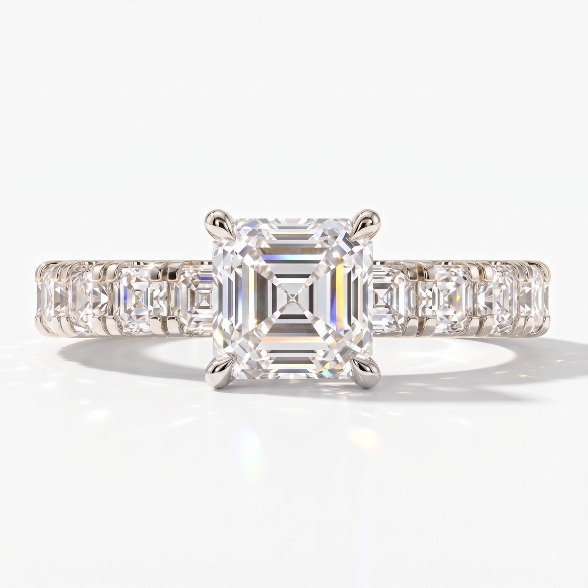 Asscher cut lab-grown diamond engagement ring with Asscher side stones in 950 platinum, front view 