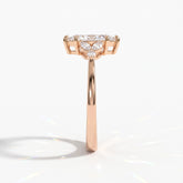 Marquise cut lab-grown diamond leaf cluster engagement ring with marquise and round accents in 18K (750) rose gold, side view 