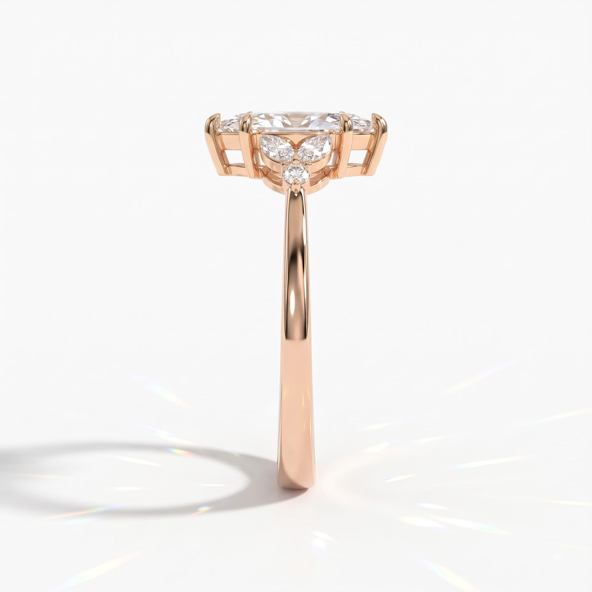 Marquise cut lab-grown diamond leaf cluster engagement ring with marquise and round accents in 18K (750) rose gold, side view 