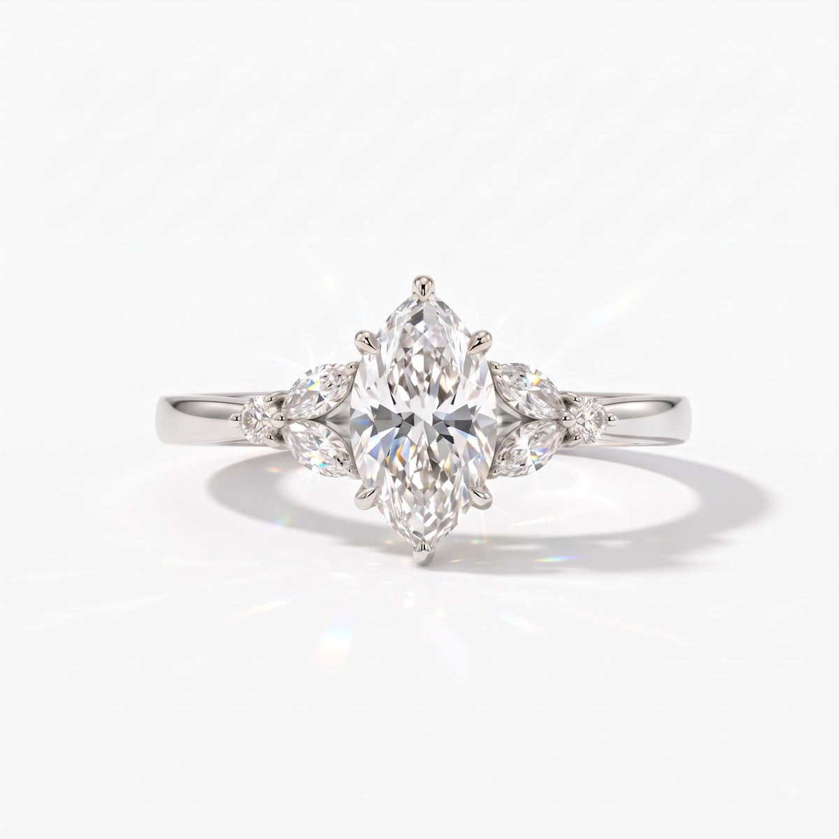 Marquise cut lab-grown diamond leaf cluster engagement ring with marquise and round accents in 18K (750) white gold, front view 