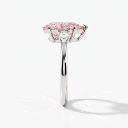 Fancy Vivid Pink pear cut lab-grown diamond three-stone ring with pear side diamonds in 18K (750) white gold, side view 