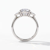 Pear cut lab-grown diamond three-stone engagement ring with pear side stones in 18K (750) white gold, upright profile view 