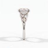 Oval lab-grown diamond cluster engagement ring with marquise and round leaf accents in 18K (750) white gold, side view 