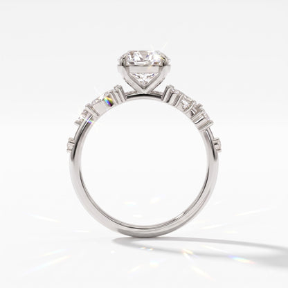 Oval lab-grown diamond cluster engagement ring with marquise and round leaf accents in 18K (750) white gold, upright profile view 