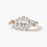 Oval lab-grown diamond cluster engagement ring with marquise and round leaf accents in 18K (750) white gold, front view 