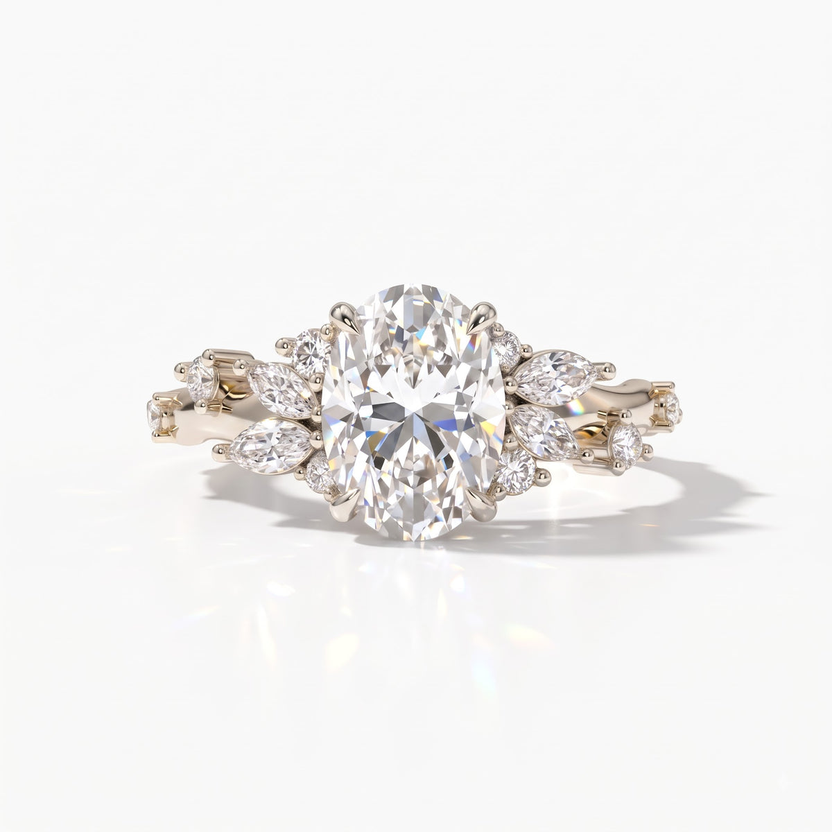 Oval lab-grown diamond cluster engagement ring with marquise and round leaf accents in 18K (750) white gold, front view 