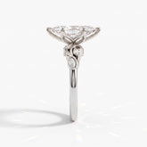 Marquise cut lab-grown diamond vine engagement ring with marquise leaf accents in 18K (750) white gold, side view 