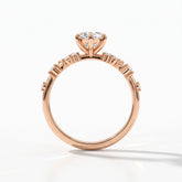 Marquise cut lab-grown diamond cluster engagement ring with marquise and round leaf accents in 18K (750) rose gold, upright profile view 