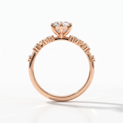 Marquise cut lab-grown diamond cluster engagement ring with marquise and round leaf accents in 18K (750) rose gold, upright profile view 