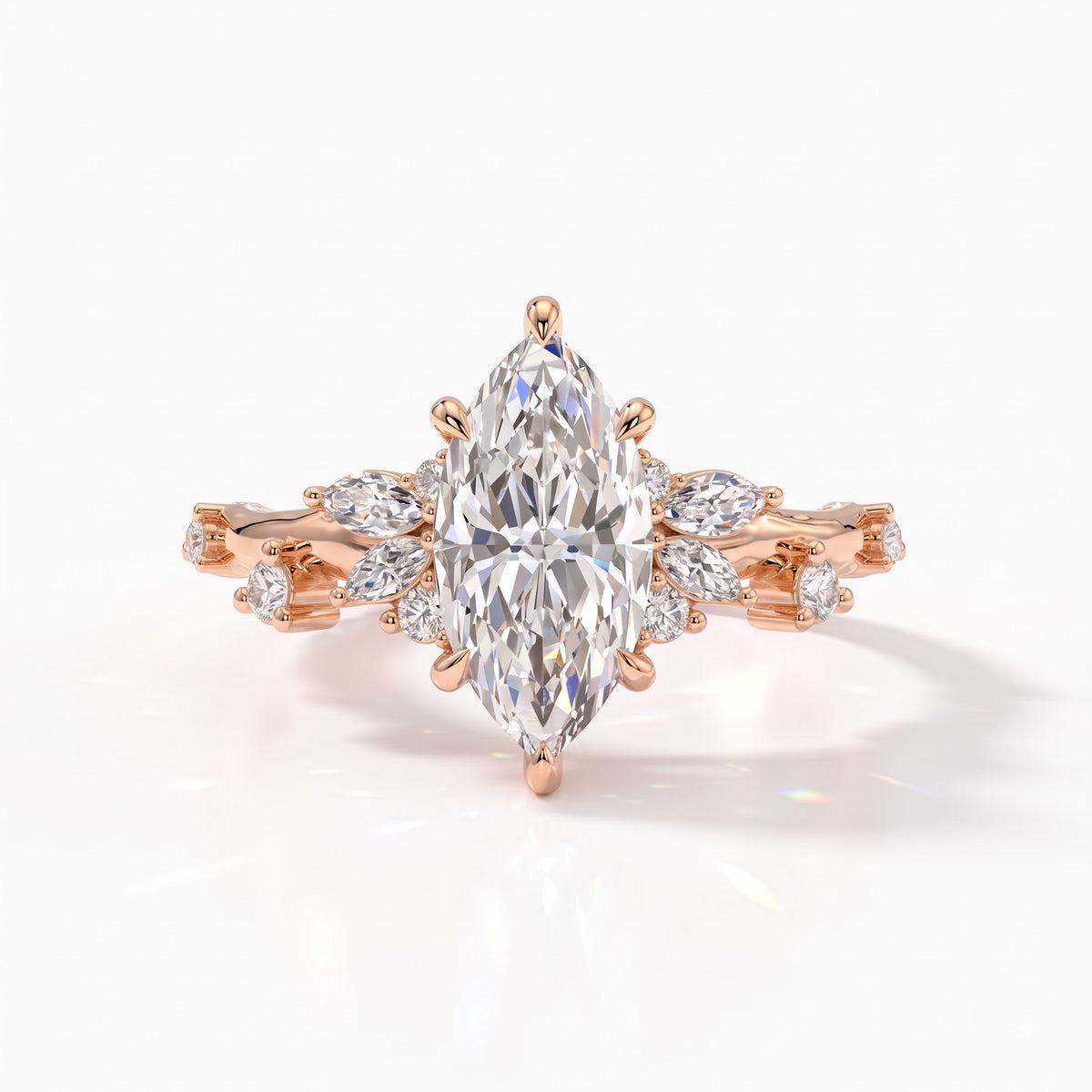 Marquise cut lab-grown diamond cluster engagement ring with marquise and round leaf accents in 18K (750) rose gold, front view 