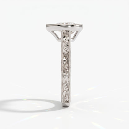 Pear cut lab-grown diamond vintage bezel engagement ring with hand-engraved milgrain band in 950 platinum, side view 