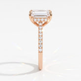 Emerald cut lab-grown diamond hidden halo engagement ring with pavé band in 14K (585) rose gold, side view 