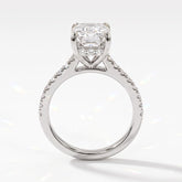 Emerald cut lab-grown diamond hidden halo engagement ring with pavé band in 18K (750) white gold, upright profile view 