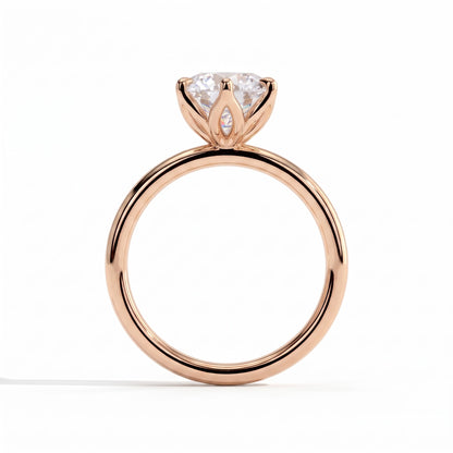 Round lab-grown diamond solitaire engagement ring in 14K (585) rose gold, side profile 
