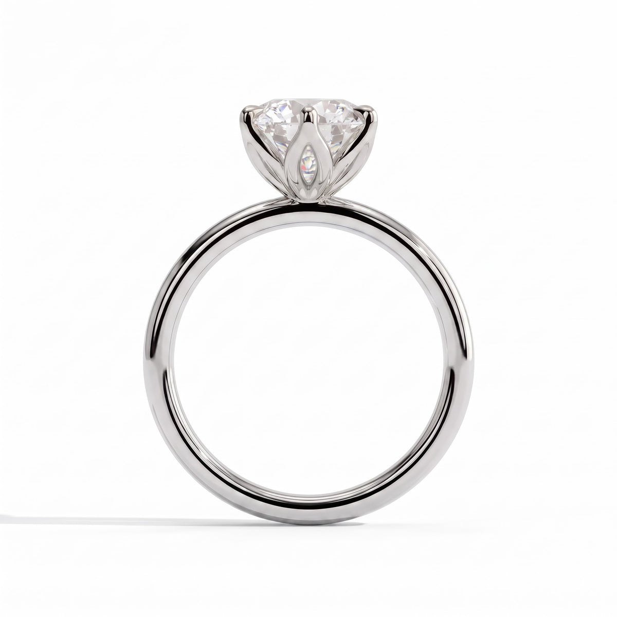 Round lab-grown diamond solitaire engagement ring in 18K (750) white gold, side profile 