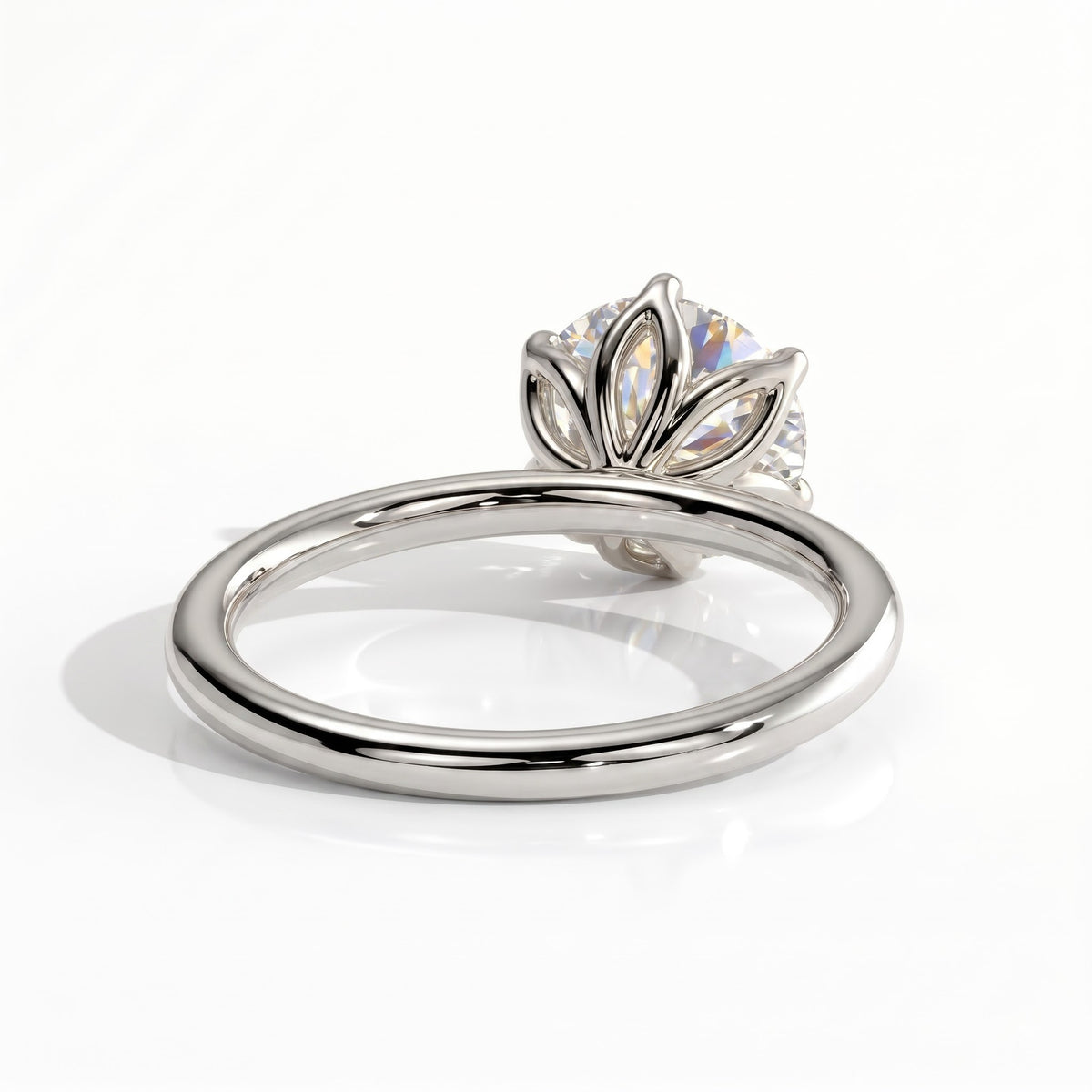 Round lab-grown diamond solitaire engagement ring in 950 platinum, on white background 