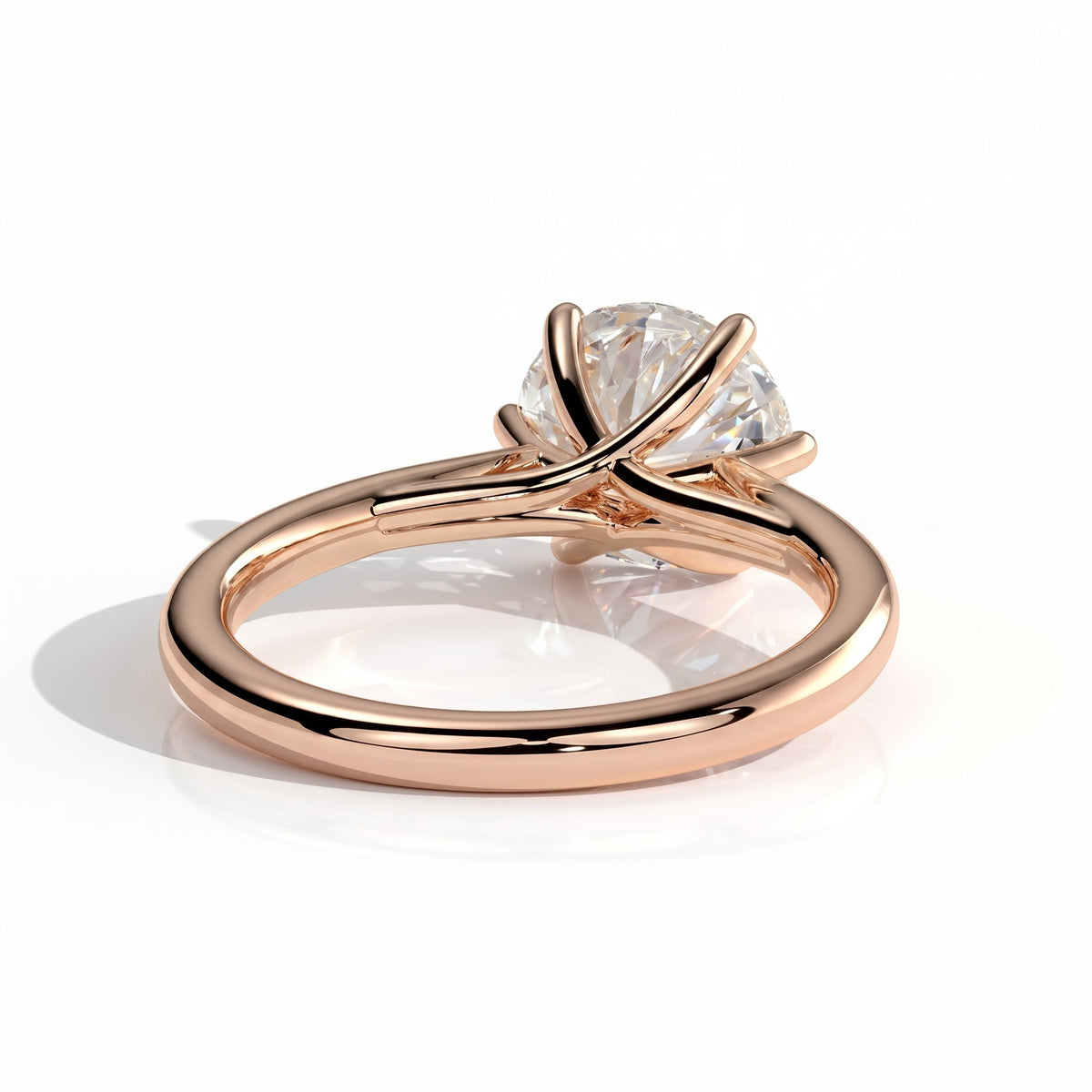 Round lab-grown diamond solitaire engagement ring in 14K (585) rose gold, on white background 