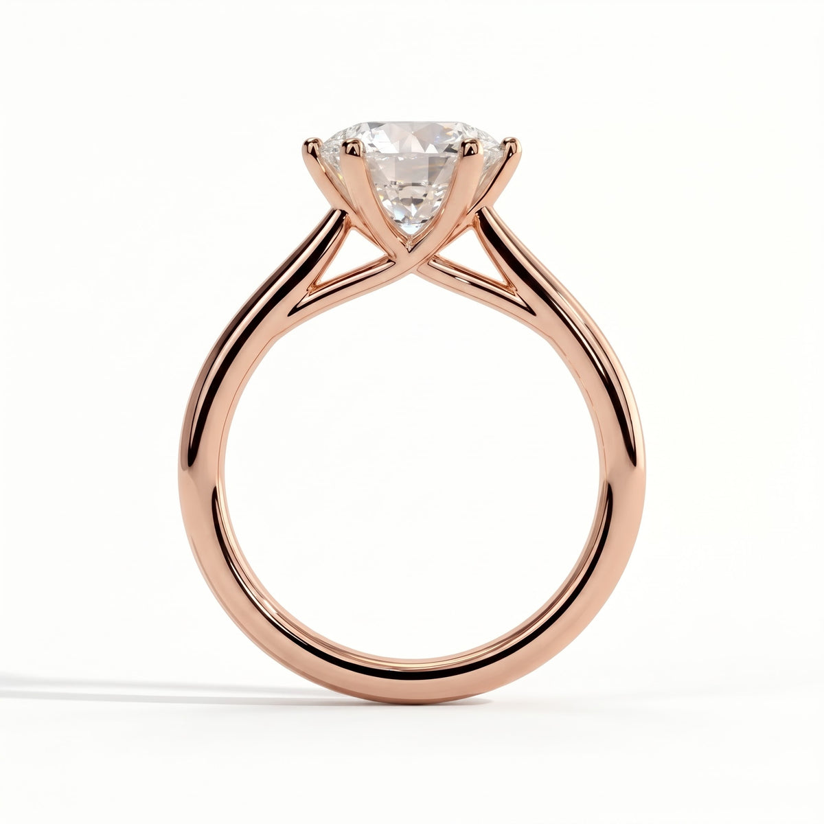 Round lab-grown diamond solitaire engagement ring in 14K (585) rose gold, side profile 