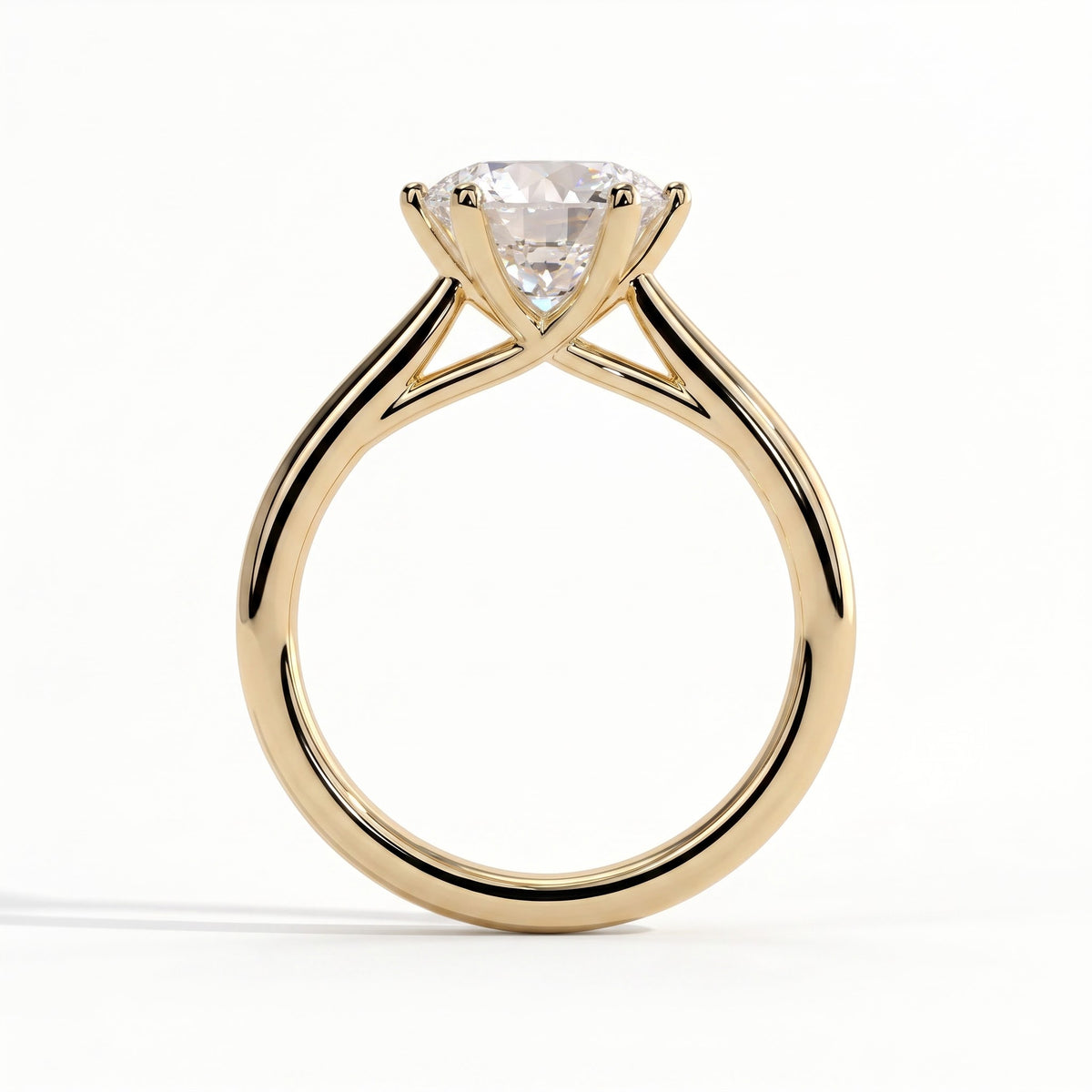 Round lab-grown diamond solitaire engagement ring in 14K (585) yellow gold, side profile 