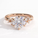 Round lab-grown diamond halo engagement ring in 14K (585) rose gold, front view 
