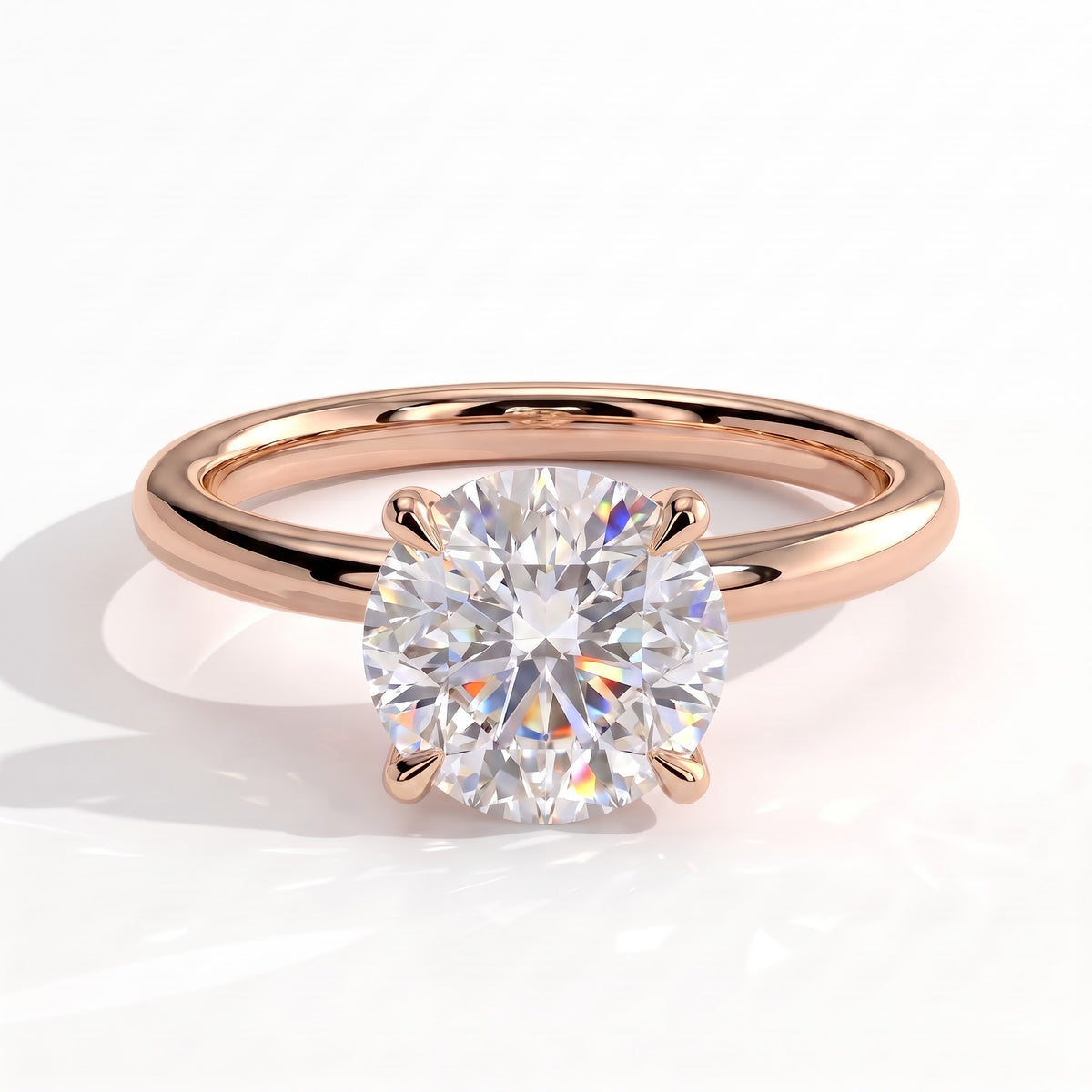 Round lab-grown diamond solitaire engagement ring in 14K (585) rose gold, front view 