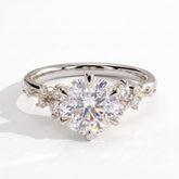 Round lab-grown diamond halo engagement ring in 950 platinum, front view 