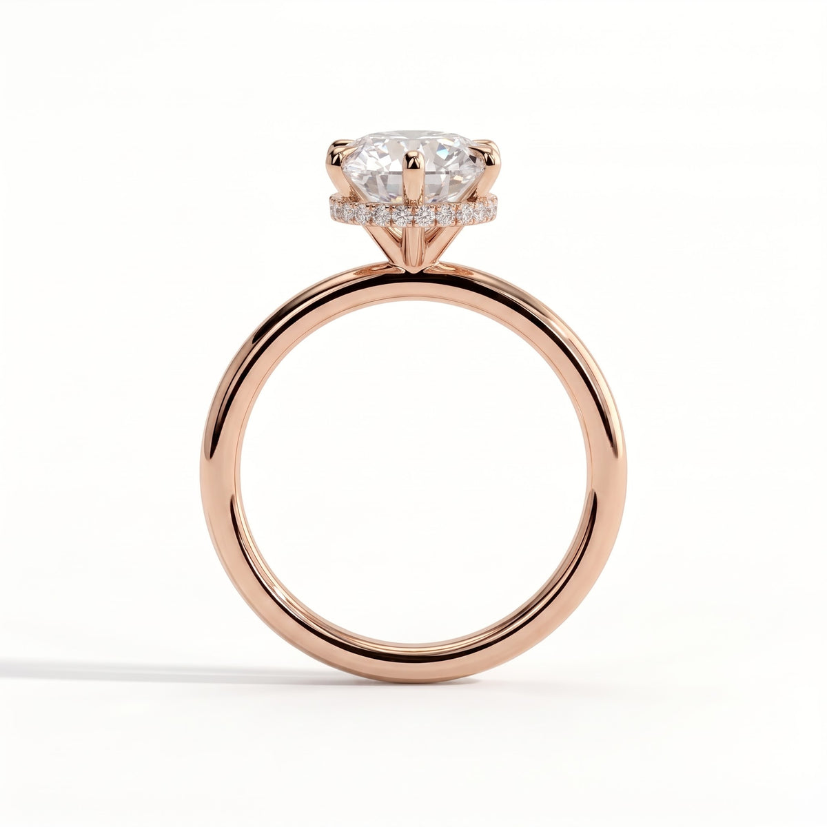Round lab-grown diamond solitaire engagement ring in 14K (585) rose gold, side profile 