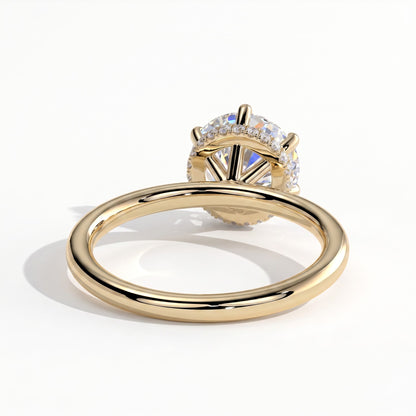 Round lab-grown diamond solitaire engagement ring in 14K (585) yellow gold, on white background 