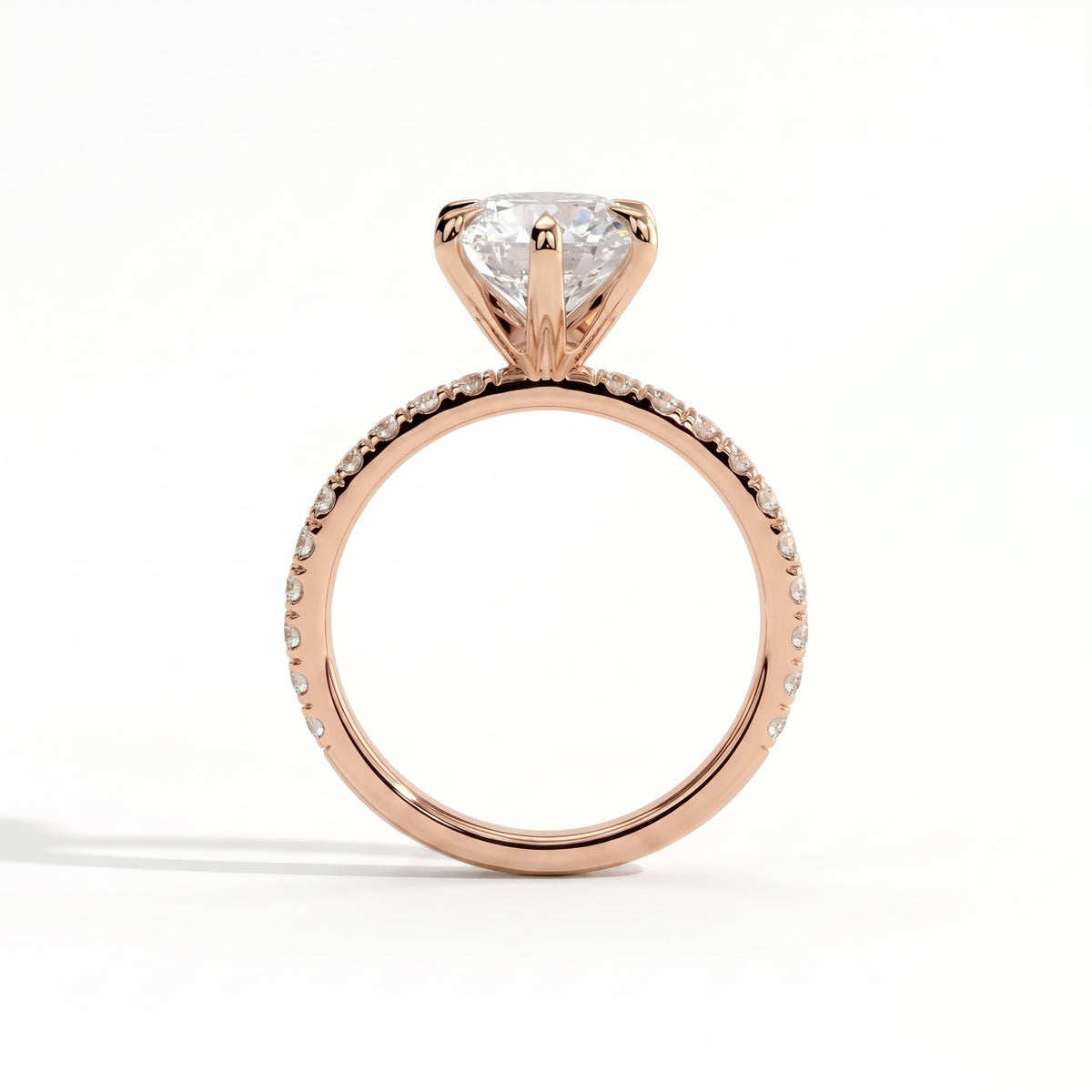 Round lab-grown diamond halo engagement ring in 14K (585) rose gold, side profile 