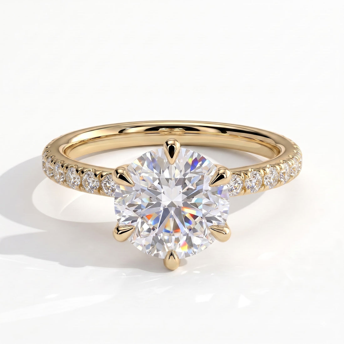Round lab-grown diamond halo engagement ring in 14K (585) yellow gold, front view 