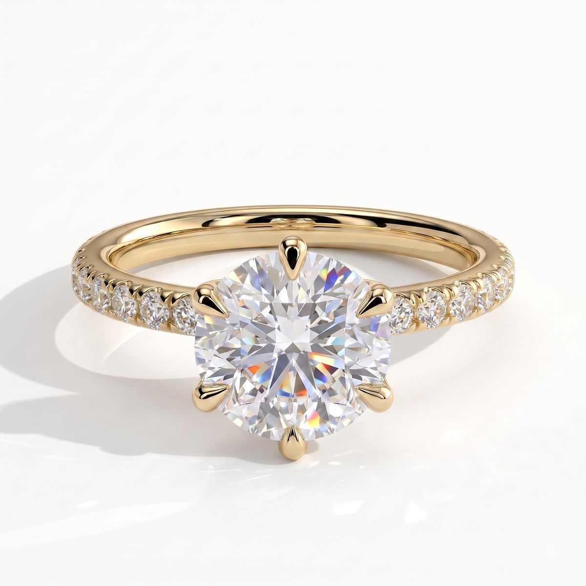 Round lab-grown diamond halo engagement ring in 14K (585) yellow gold, front view 