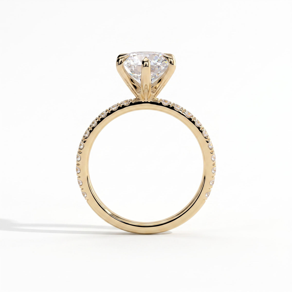 Round lab-grown diamond halo engagement ring in 14K (585) yellow gold, side profile 