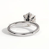 Round lab-grown diamond halo engagement ring in 14K (585) white gold, on white background 
