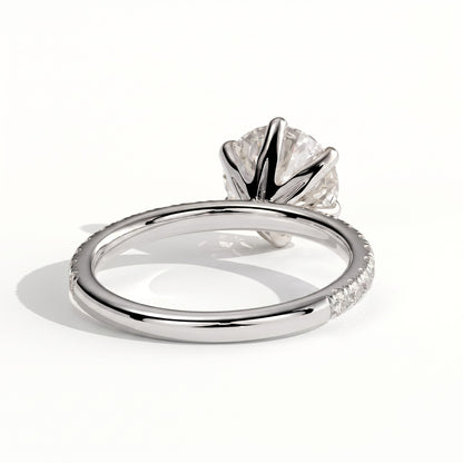 Round lab-grown diamond halo engagement ring in 14K (585) white gold, on white background 