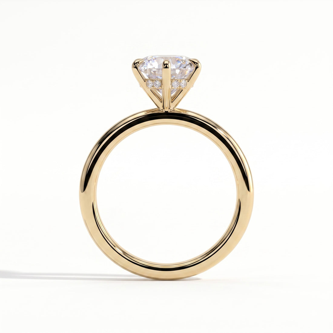 Round lab-grown diamond solitaire engagement ring in 14K (585) yellow gold, side profile 